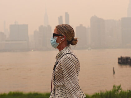 Smoke from massive wildfires in Canada engulfed the New York City skyline, reducing visibi