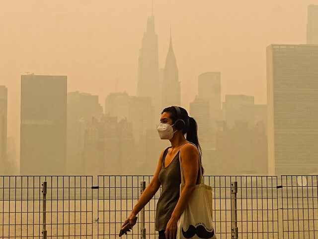 Smoke from massive wildfires in Canada engulfed the New York City skyline, reducing visibi