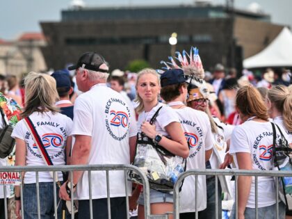 People follow evacuation orders due to thunderstorms in the area during the "Salute to Ame