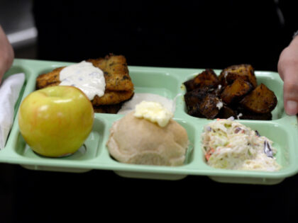 A tray of food being served to senior citizens during senior lunch at the Josephine Common