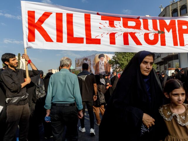 TEHRAN, IRAN - JULY 6: Mourners display a banner that reads Kill Trump during the third da