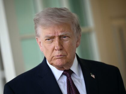 US President Donald Trump speaks to the press outside the Oval Office at the White House i