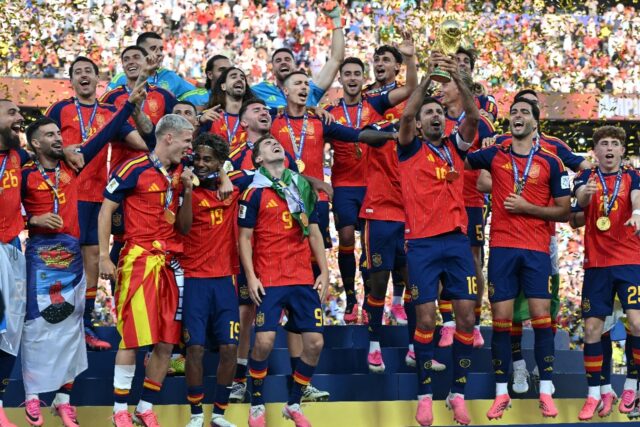Spain captain Rodri lifts the World Cup trophy