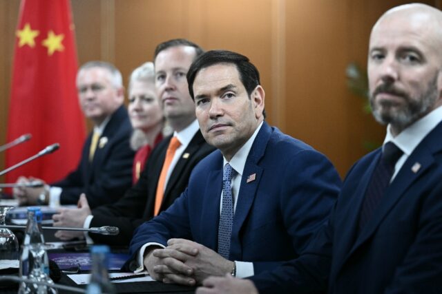 US Secretary of State Marco Rubio (C) during a meeting with China's Foreign Minister