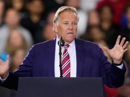 Republican Senate candidate Mike Rogers speaks before President Donald Trump at an event a