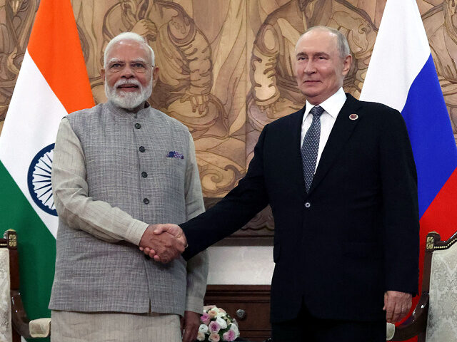 8-31-26- Russia-Vladimir-Putin-India-Narendra-Modi-getty BISHKEK, KYRGYZSTAN - AUGUST 31: Russian President Vladimir Putin shakes hands with Indian