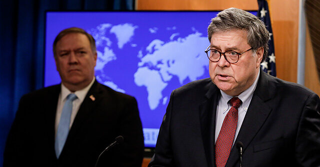 Title: US International Court Image ID: 20163530361130 Article: Attorney General William Barr speaks as Secretary of State Mike Pompeo listens, during a joint briefing, Thursday, June 11, 2020 at the State Department in Washington, on an executive order signed by President Donald Trump aimed at the International Criminal Court. Trump has lobbed a broadside attack against the International Criminal Court. He's authorizing economic sanctions and travel restrictions against court workers directly involved in investigating American troops and intelligence officials for possible war crimes in Afghanistan without U.S. consent. The executive order Trump signed on Thursday marks his administration’s latest attack against international organizations, treaties and agreements that do not hew to its policies. (Yuri Gripas/Pool via AP)
