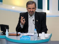 Title: Iran Elections Image ID: 21156756242584 Article: In this photo made available by the government-affiliated Young Journalists Club, presidential candidate Mohsen Rezaei speaks in a televised debate in a state-run television studio, in Tehran, Iran, on Saturday, June 5, 2021. Elections are scheduled for June 18. (Morteza Fakhri Nezhad/YJC via AP)