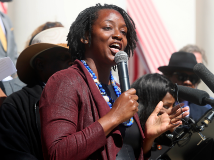 Rep. Angie Nixon, D-Jacksonville, speaks at a rally against Gov. Ron DeSantis' redist