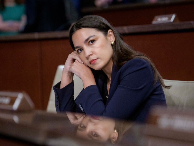 Rep. Alexandria Ocasio-Cortez, D-N.Y., listens to the testimony of the witnesses during a
