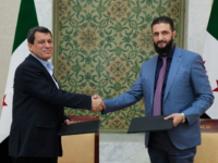 Syria’s President Names Former Head of Kurdish Anti-ISIS Force as Adviser