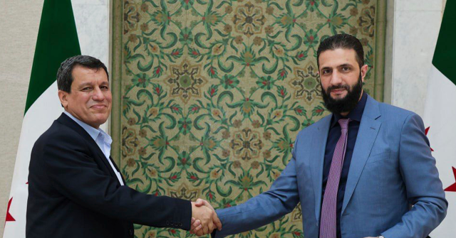 Syria’s President Names Former Head of Kurdish Anti-ISIS Force as Adviser
