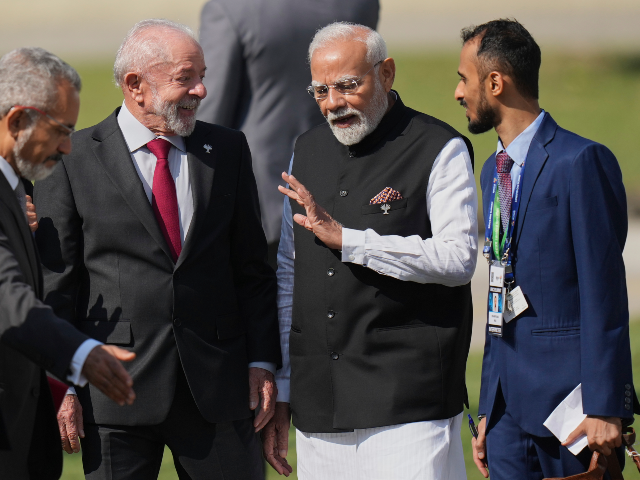 AP25187534505154 India's Prime Minister Narendra Modi, second from right, chats with Brazilian Preside