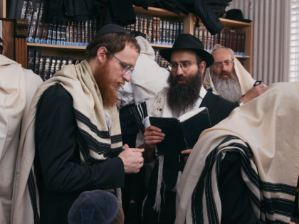 Chabad-Lubavitch rabbis gather in prayer at the resting place of the Rebbe, Rabbi Menachem