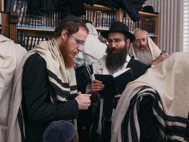 AP25318709793230 Chabad-Lubavitch rabbis gather in prayer at the resting place of the Rebbe, Rabbi Menachem