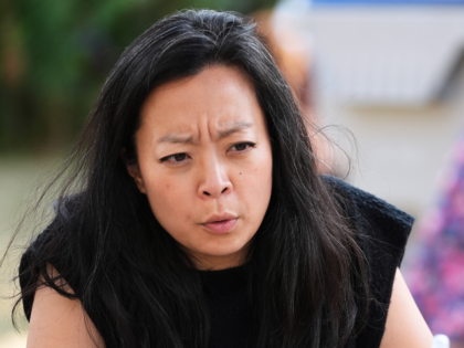 Democratic gubernatorial candidate Francesca Hong talks with a Milwaukee resident during &