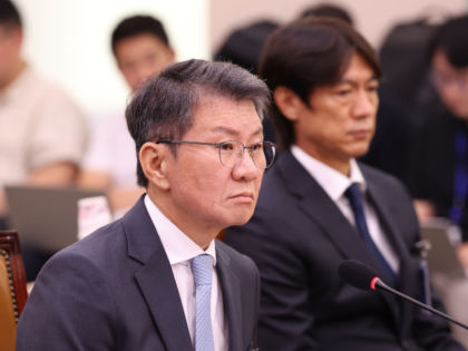 Former KFA President Chung Mong-gyu, left, and former South Korean men's national tea