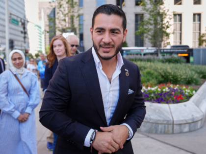 Abdul El-Sayed arrives for a news conference at the Spirit of Detroit shortly after winnin