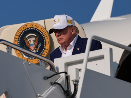 President Donald Trump disembarks Air Force One, Sunday, Aug. 9, 2026, at Joint Base Andre