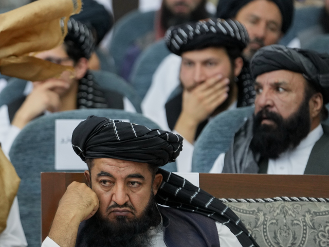 Taliban delegates from across the country attend a meeting that opens celebrations marking