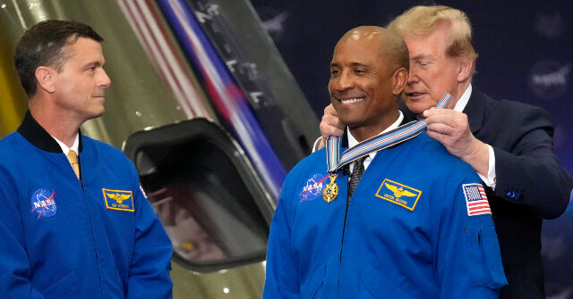 Artemis ll astronaut Victor Glover receives the Congressional Space Medal of Honor from Donald Trump