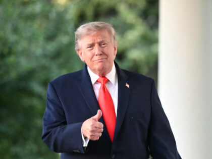 US President Donald Trump arrives to speak during a Rose Garden Club dinner with American