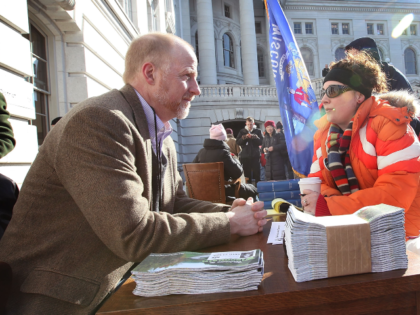 MADISON, WI - MARCH 02: Wisconsin State representative Fred Clark (L) meets with constitue