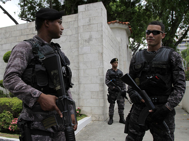 Dominican police officers tighten security at the US embassy in Santo Domingo on May 3, 20