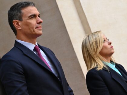 Italy's Prime Minister, Giorgia Meloni and her Spanish counterpart Pedro Sanchez stand at