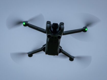 GLASTONBURY, UNITED KINGDOM - NOVEMBER 28: A DJI drone, a Mini 3 Pro, flies above the grou