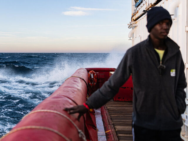ITALY-MIGRANTS-EU-NGO A migrant stands on the deck of rescue ship "Ocean Viking" operated by the NGO S