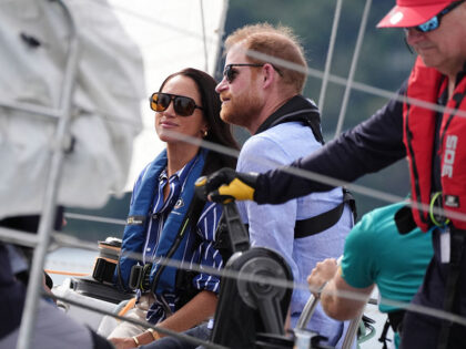 Britain's Prince Harry, Duke of Sussex, and his wife Meghan, the Duchess of Sussex, t