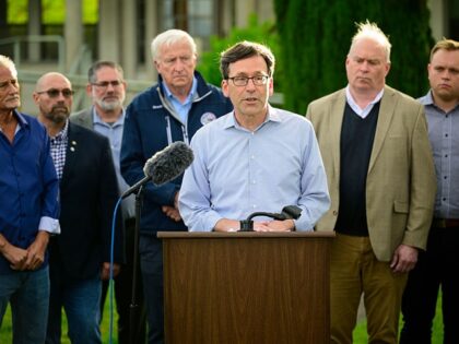 Fires - LONGVIEW, WASHINGTON - MAY 26: Washington Gov. Bob Ferguson addresses reporters ou
