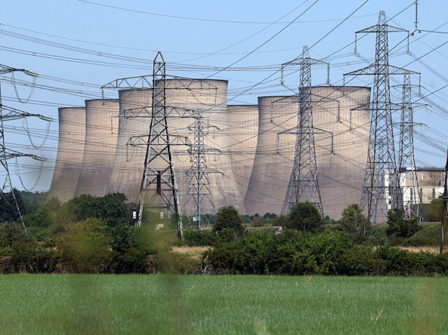 BRITAIN-ENVIRONMENT-CLIMATE-HEATWAVE Electricity pylons stand in front of the closed Ratcliffe on Soar Power Station, in centra