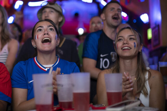French fans watching the 2026 FIFA World Cup quarterfinal match between France and Morocco