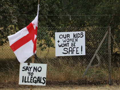 THETFORD, ENGLAND - JULY 15: A protest camp with flags and signs has been established outs