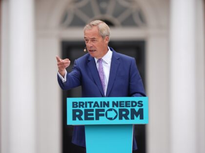 Reform UK leader Nigel Farage speaking during a Reform UK rally at Kimberley Hall in Wymon