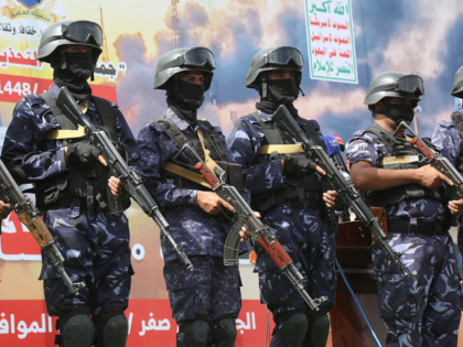 SANA'A, YEMEN - JULY 17: Yemeni security forces loyal to the Houthi movement stand guard d