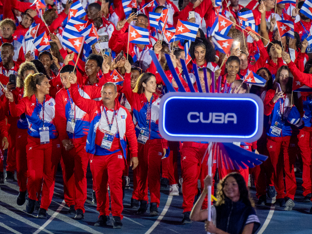 GettyImages-2286968448 The delegation of Cuba parades during the opening ceremony of the XXV Central American and