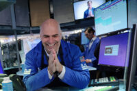 NEW YORK, NEW YORK - JULY 30: Traders work on the floor of the New York Stock Exchange during morning trading on July 30, 2026 in New York City. All three major indexes rose at the opening of trading a day after the Federal Reserve decided to hold rates steady, which saw the Dow Jones lose over 1000 points. (Photo by Michael M. Santiago/Getty Images)