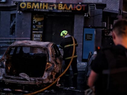 KYIV, UKRAINE - AUGUST 1: Firefighters work at the site of a Russian missile strike on Aug
