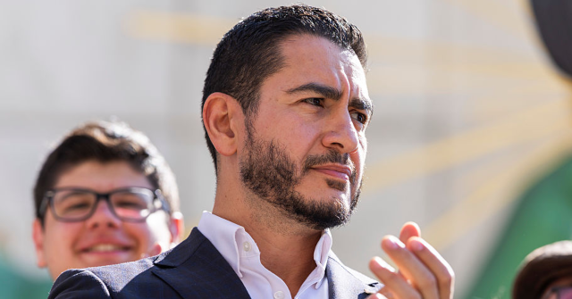 DETROIT, MICHIGAN - AUGUST 05: Michigan Democratic Senate primary winner Abdul El-Sayed claps during a press conference in front of the Spirit of Detroit statue on August 05, 2026 in Detroit, Michigan. Sayed called on Michiganders to unite against Mike Rodgers as well as challenging him to multiple debates. (Photo by Finn Gomez/Getty Images)