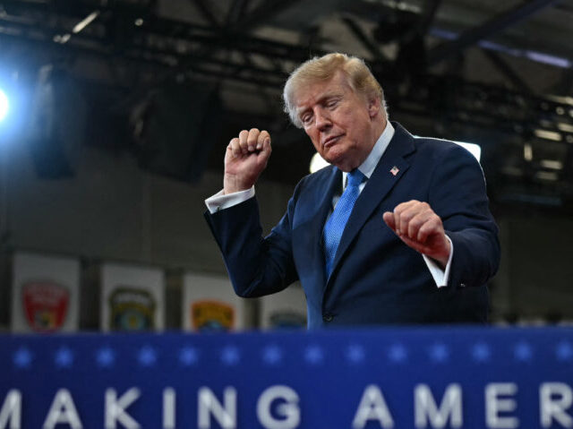 US-POLITICS-TRUMP US President Donald Trump dances as he departs after delivering remarks at the Nassau Coun