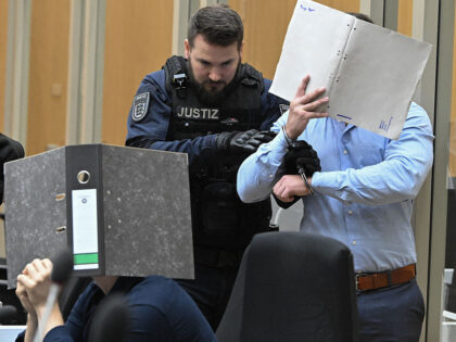 Two of totally three Ukrainian defendants, who are accused for plotting to send exploding