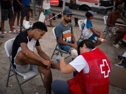 CEUTA, SPAIN - AUGUST 14: A wounded migrant receives treatment on August 14, 2026 in Ceuta