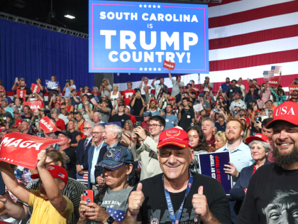 MYRTLE BEACH, SOUTH CAROLINA - AUGUST 21: Supporters listen as U.S. President Donald Trump
