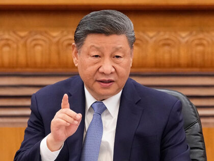 Chinese President Xi Jinping speaks during an international business meeting at The Great