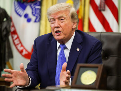 GettyImages2289377473 U.S. President Donald Trump speaks during an event in the Oval Office of the White House o