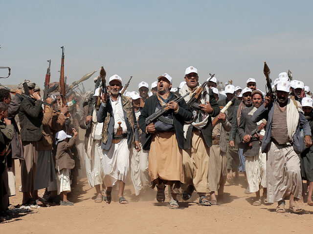 FILE - Houthi fighters march during a rally of support for the Palestinians in the Gaza St