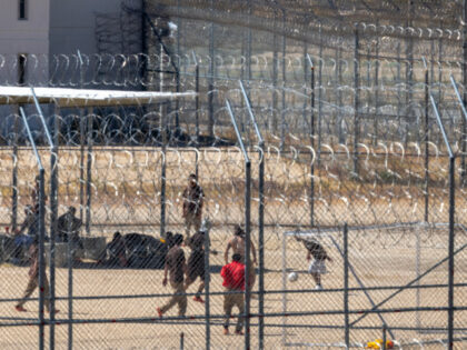 Immigration Detention Center Prisoners are seen inside a prison exercise yard at the California City Immigration Proces